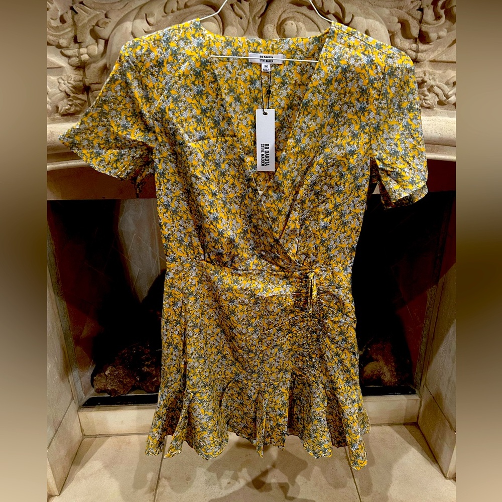 Lovely dress, brand new with tags.  See photos for details.